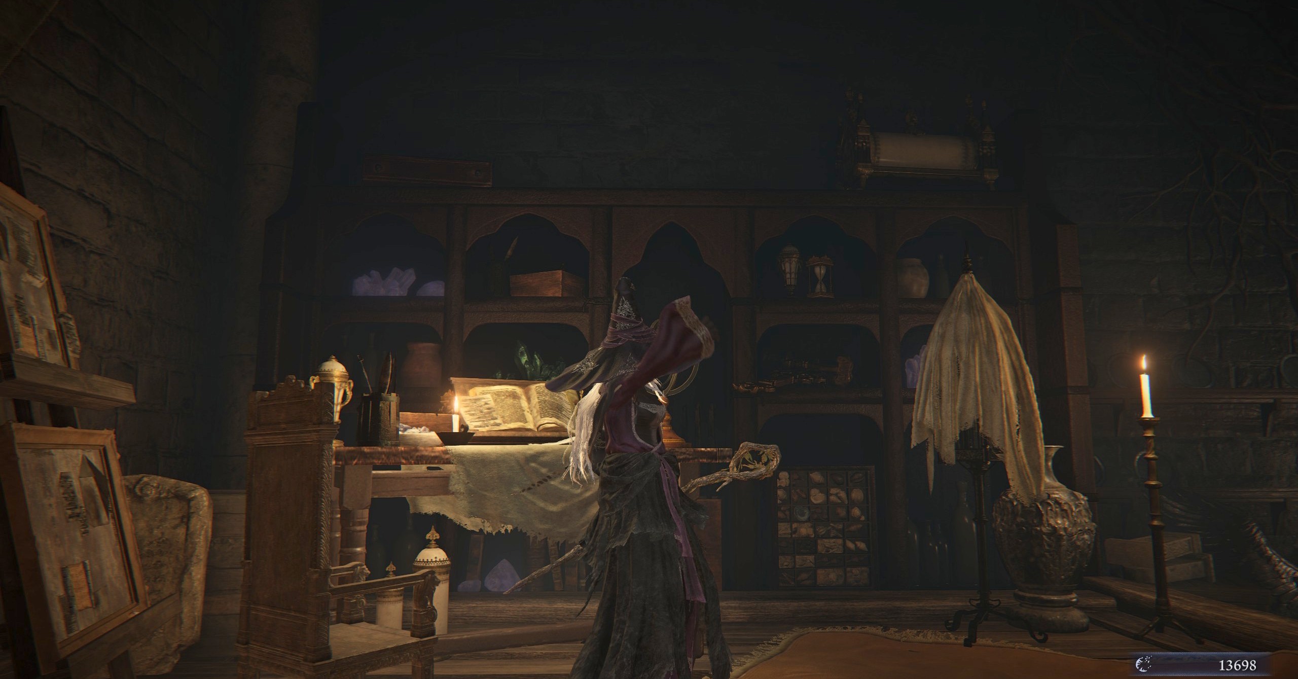 The Recluse in Elden Ring Nightreign, standing near a journal
