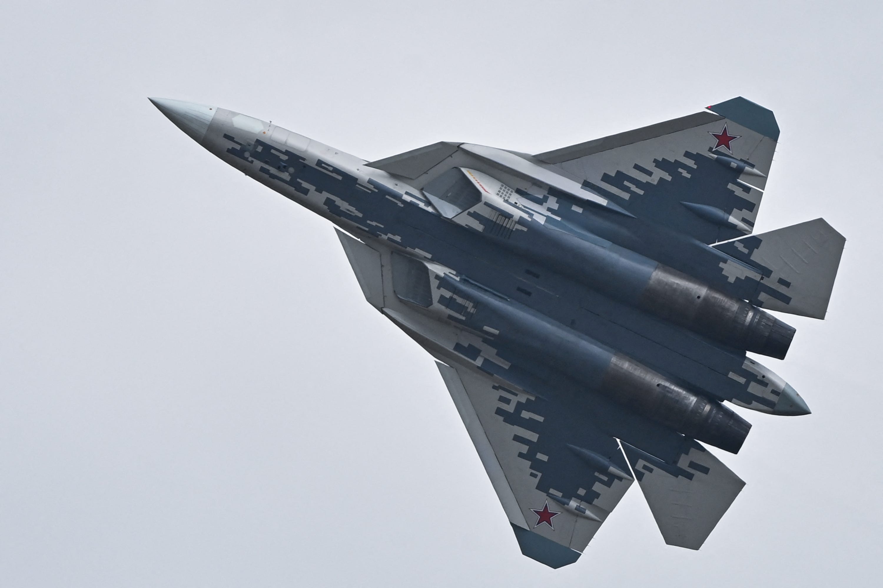 A Russian Sukhoi Su-57 fifth-generation fighter aircraft flies during the 15th China International Aviation and Aerospace Exhibition in Zhuhai.