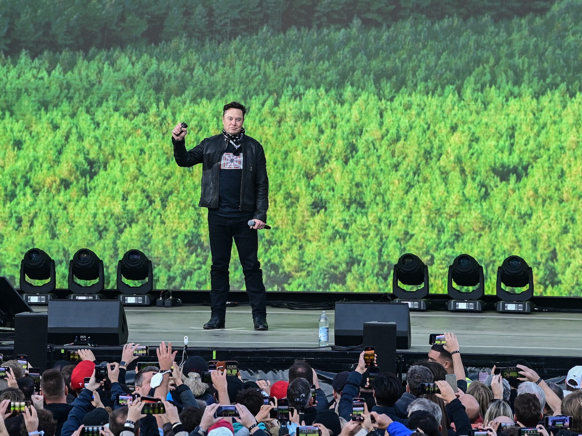 Elon Musk, Tesla CEO, stands on a stage at the Tesla Gigafactory for the open day in Grünheide, east of Berlin.