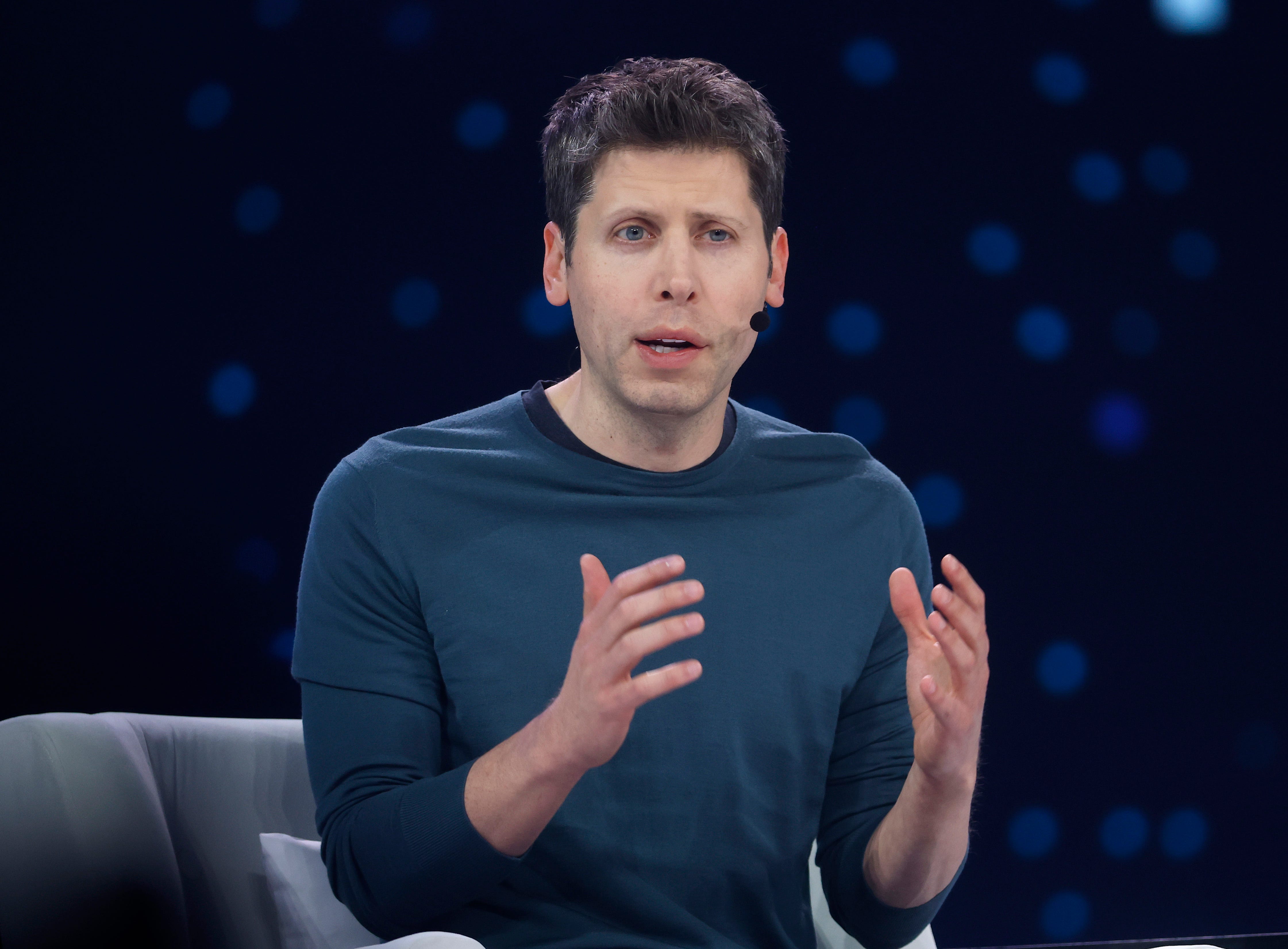 Sam Altman speaking at a conference in San Francisco, California.