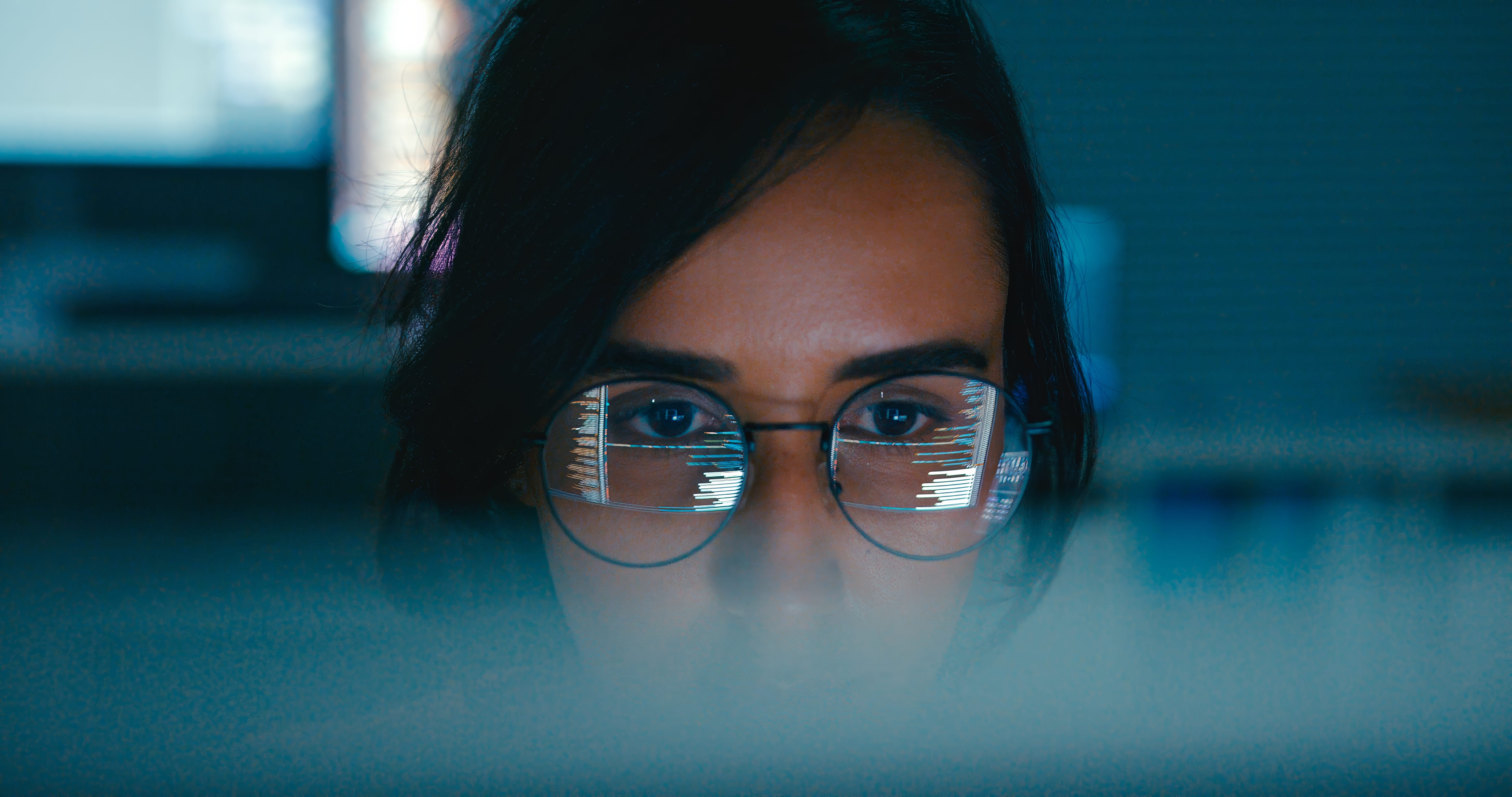 Female software engineer coding