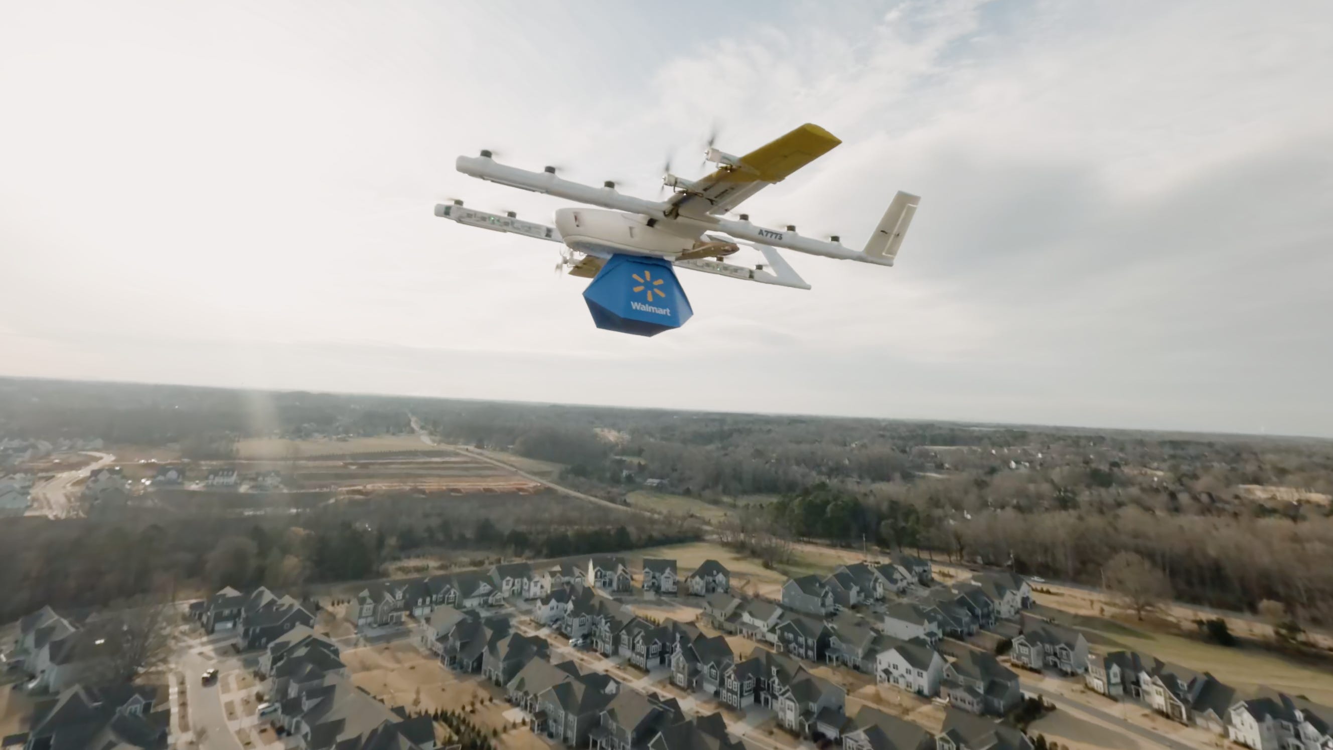 A Wing drone carrying a Walmart delivery.
