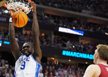 The U.S. revoked visas from a top basketball player’s country. How the NBA kept his dream alive.