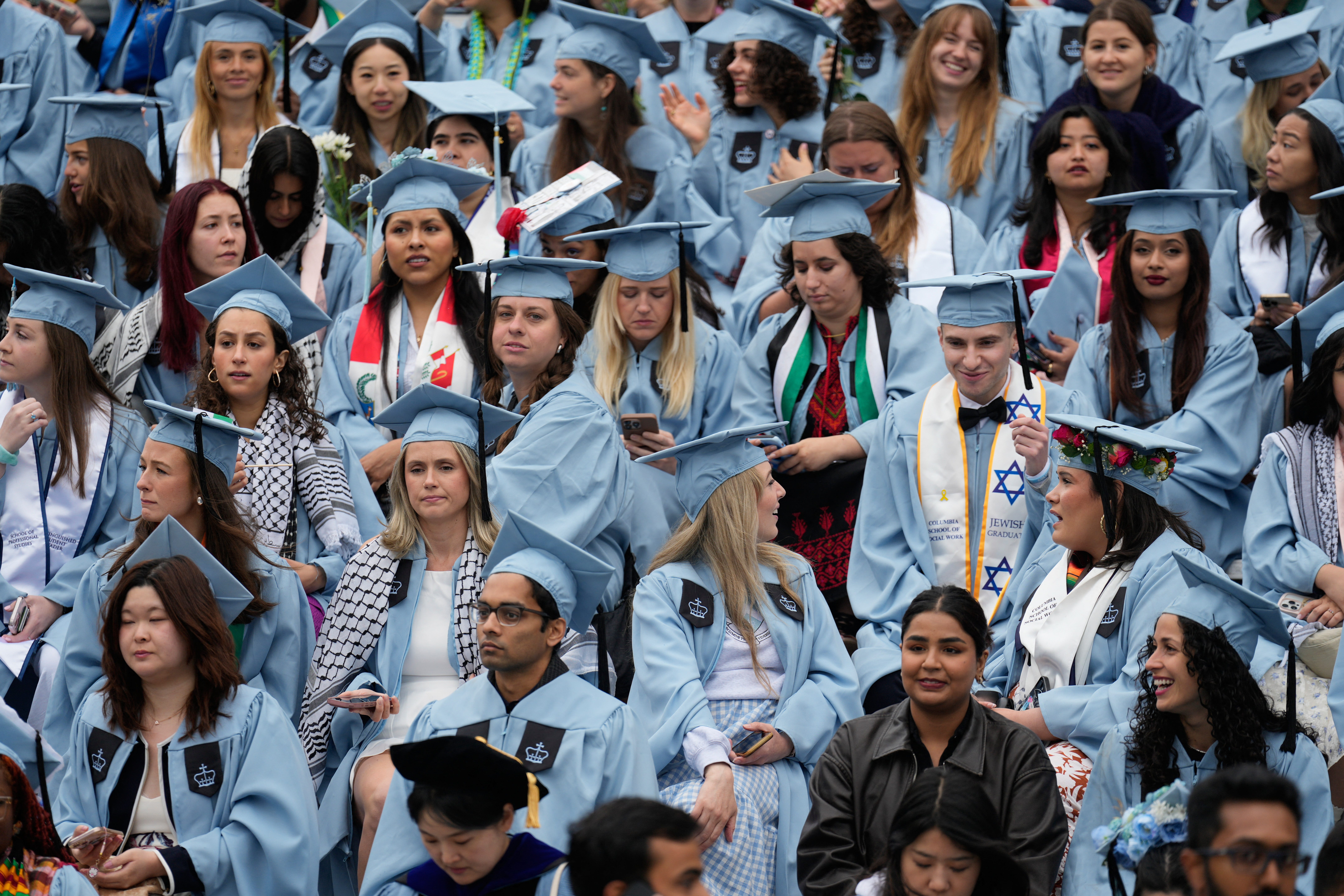 Students look on during the Commencement Ceremony at Columbia University in New York.
