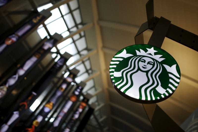 FILE PHOTO: A Starbucks store is seen inside the Tom Bradley terminal at LAX airport in Los Angeles, California, United States, October 27, 2015. REUTERS/Lucy Nicholson/File Photo