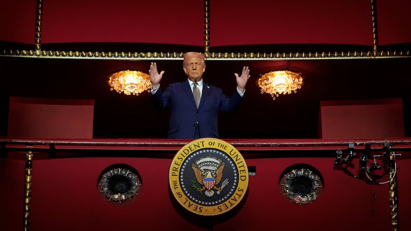 President Donald Trump looks down from the Presidential Box in the Opera House at the John F. Kennedy Center for the Performing Arts in March.
