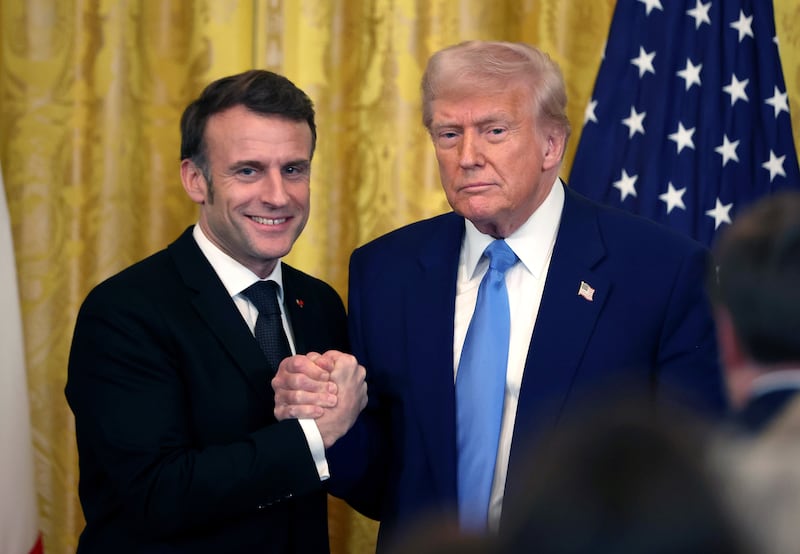 WASHINGTON, DC - FEBRUARY 24: U.S. President Donald Trump and French President Emmanuel Macron shakes hands during a joint press conference in the East Room at the White House on February 24, 2025 in Washington, DC. Macron is meeting with Trump in Washington on the third anniversary of Russia's full-scale military invasion of Ukraine. (Photo by Tasos Katopodis/Getty Images)