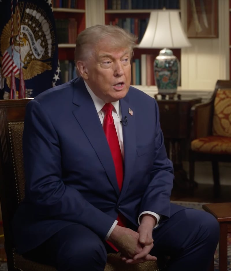 The mark appeared to be lathered with make up for Trump's appearance on Pod Force One on Monday.