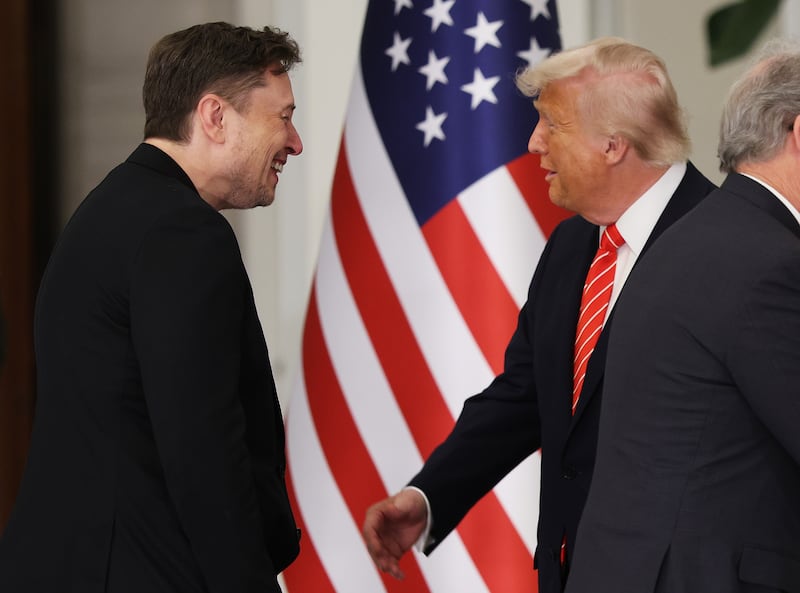 Trump greets Tesla CEO Elon Musk