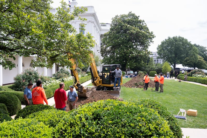 A labor crew works in the Rose Garden of the White House on June 10, 2025, in Washington, DC.