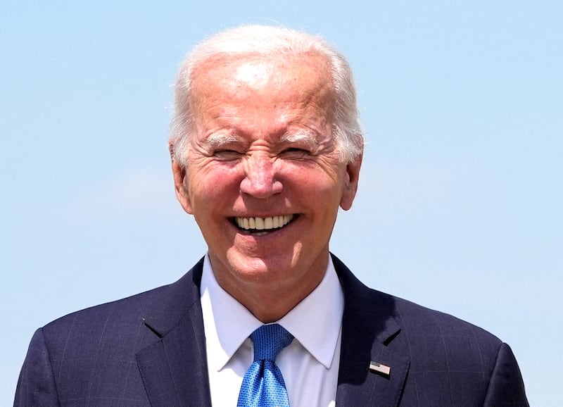 U.S. President Joe Biden smiles after arriving at Joint Base Andrews in Maryland, U.S., July 23, 2024.