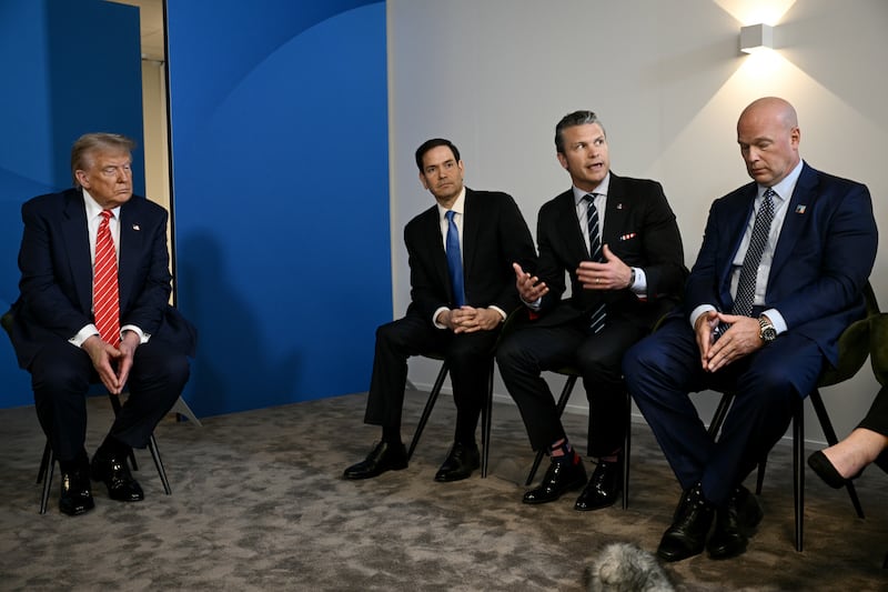 Defense Secretary Pete Hegseth speaks alongside Trump, Secretary of State Marco Rubio and U.S. Ambassador to NATO Matthew Whitaker as they address the media during the NATO summit—Hegseth said the FBI is investigating the leaked intelligence report.