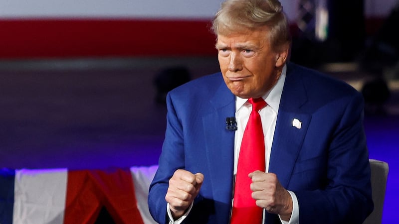 Republican presidential nominee and former U.S. President Donald Trump gestures as he attends a Fox News town hall hosted by Sean Hannity in Harrisburg, Pennsylvania, U.S. September 4, 2024.  REUTERS/Evelyn Hockstein