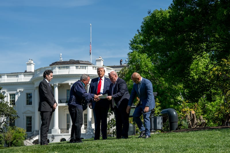 Trump said the addition of two flag poles was long overdue at the White House, where the flag flies from the roof 24/7.