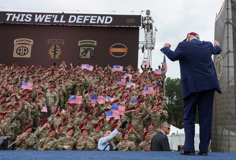 U.S. President Donald Trump dances during a rally in Fort Bragg.