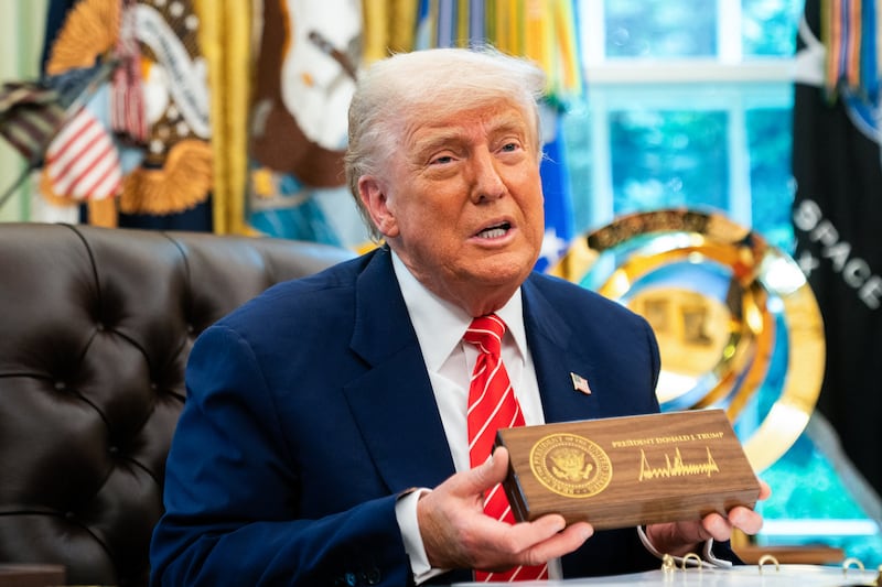 US President Donald Trump speaks during a news conference before presenting Elon Musk with a