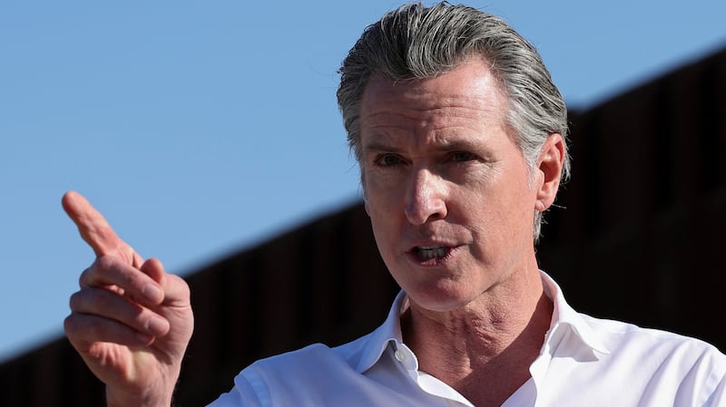 California Governor Gavin Newsom speaks on transnational commerce and border security while visiting the U.S.- Mexico border in San Diego, California, U.S. December 5, 2024. REUTERS/Mike Blake