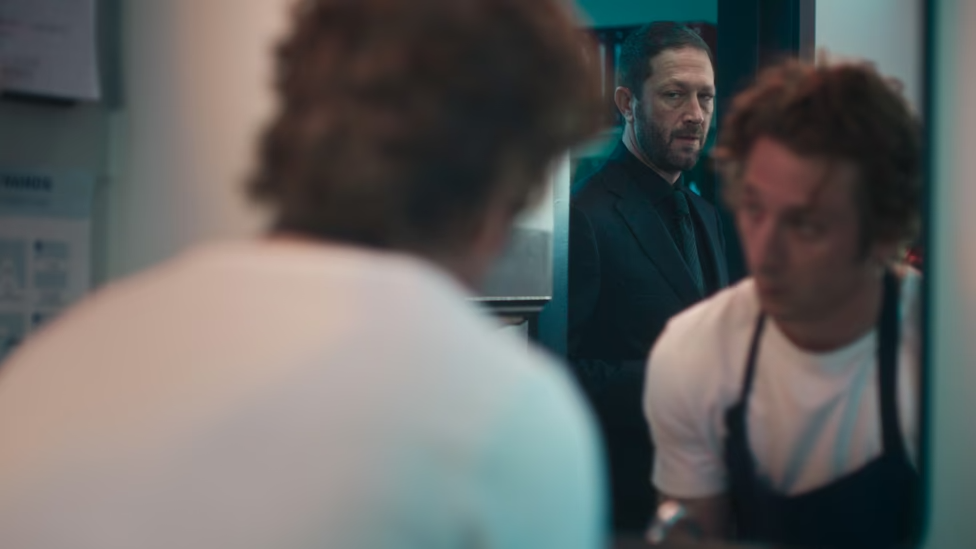 A still of The Bear showing Jeremy Allen-White and Ebon Moss-Bachrach