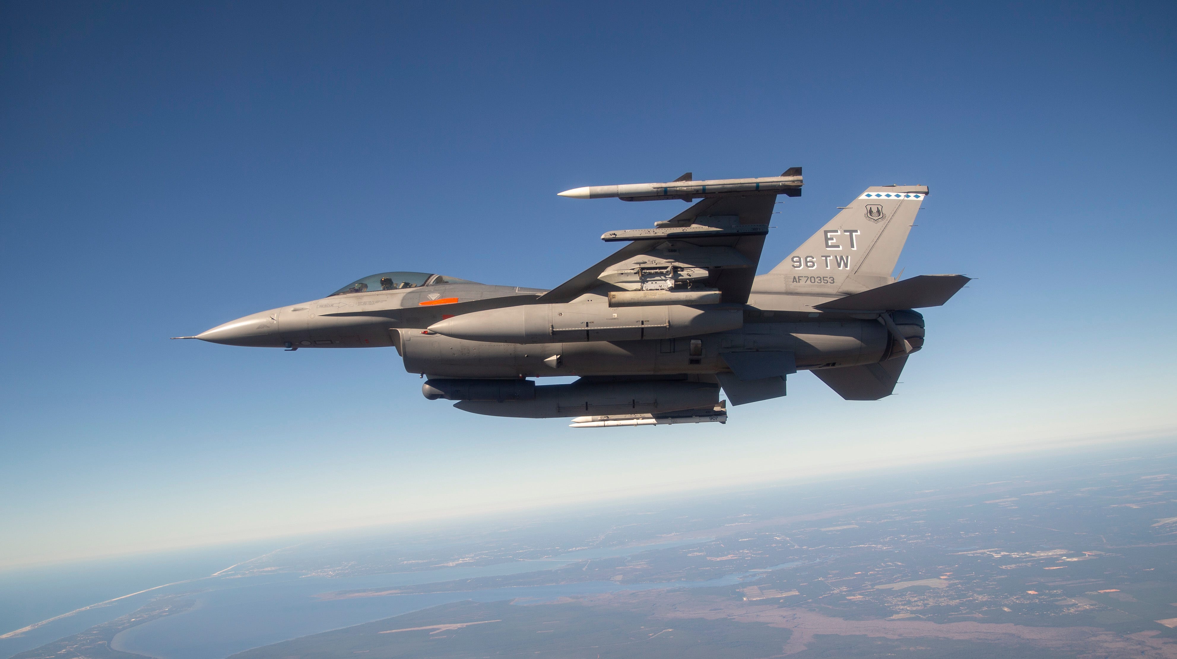An F-16 Fighting Falcon is flown by Maj Nathan "Doom" McCaskey, 40th Flight Test Squadron test pilot, during a test of the APKWS SBVU rocket near Eglin Air Force Base, FL, Nov 3, 2020.