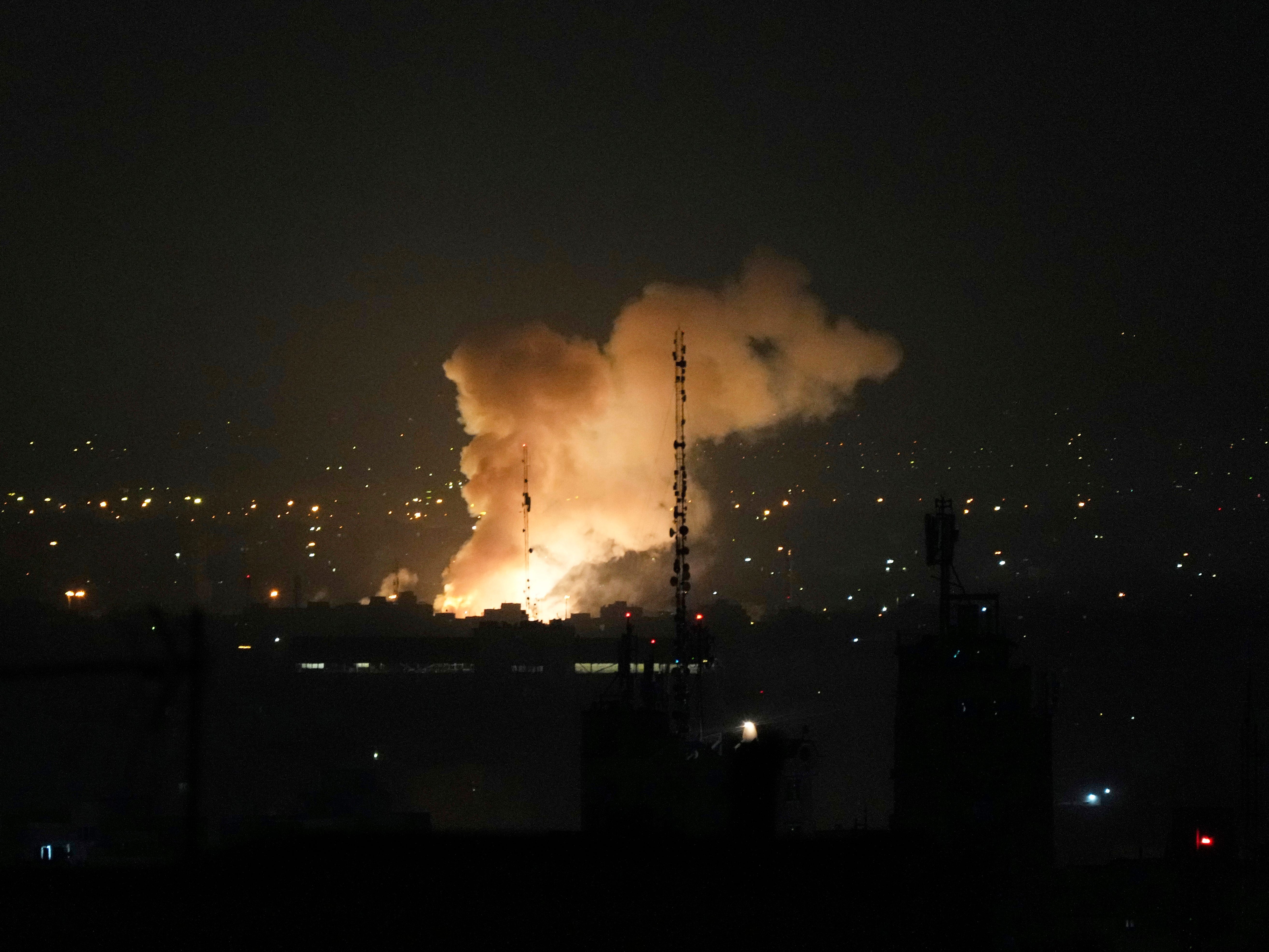 Smoke rises up after an explosion in Tehran, Iran, Friday, June 13, 2025.