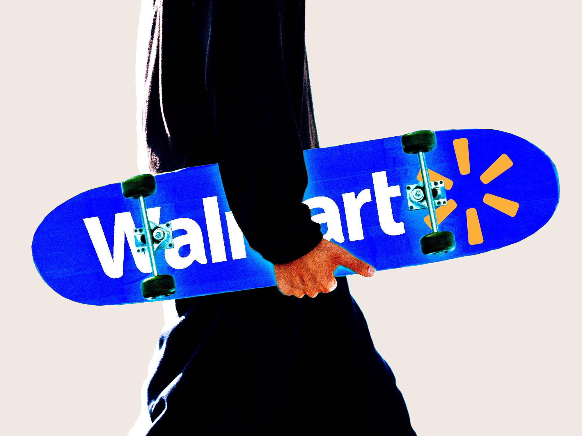 A person holding a skateboard with the Walmart logo