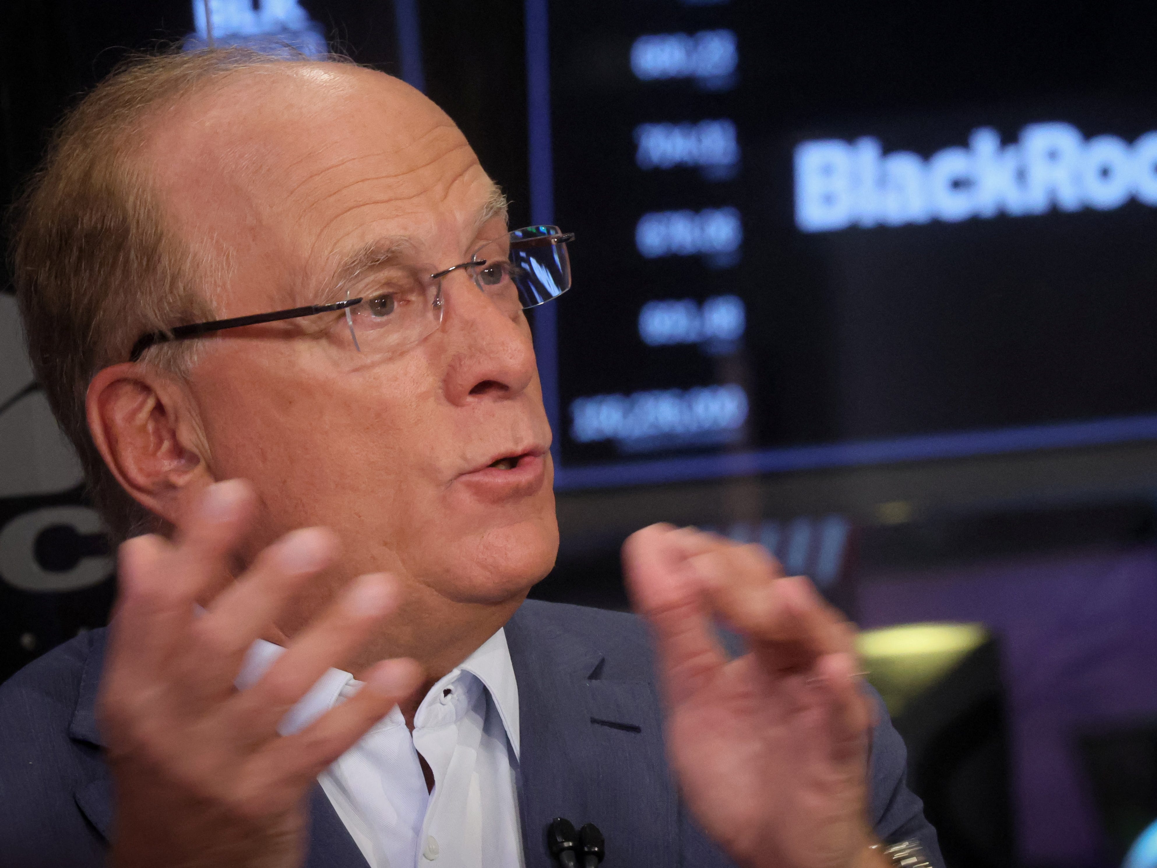 Larry Fink, Chairman and CEO of BlackRock, gesturing and speaking during an interview with CNBC on the floor of the New York Stock Exchange (NYSE) in New York City, U.S., April 14, 2023.