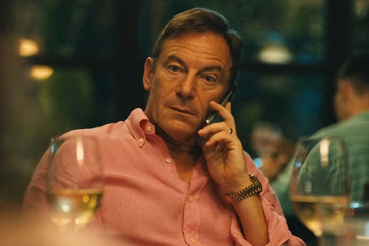 Jason Isaacs talking on the phone