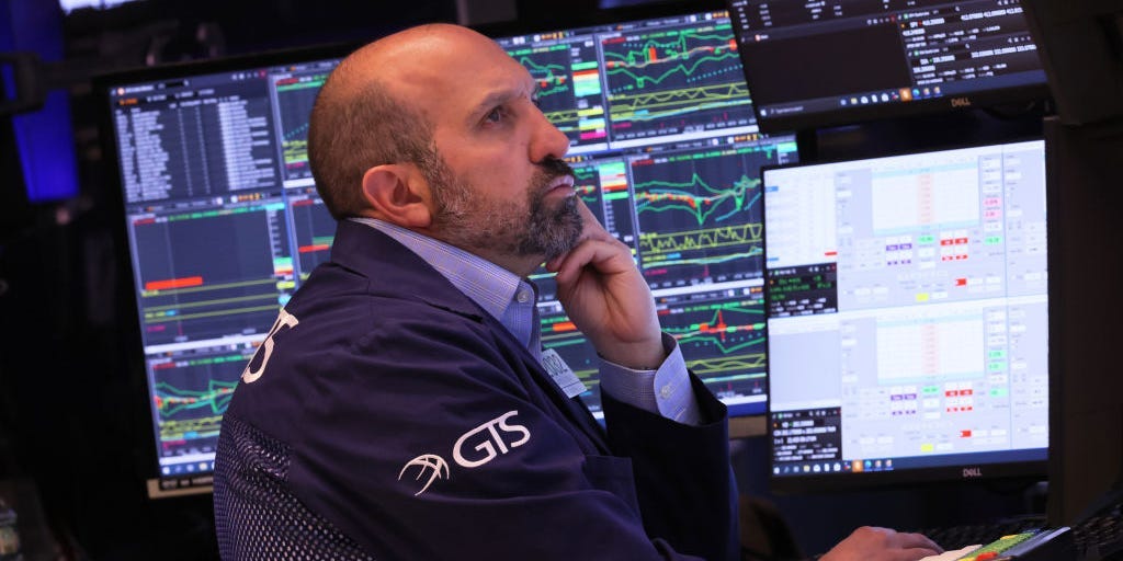 Traders work on the floor of the New York Stock Exchange during morning trading on May 17, 2023 in New York City.