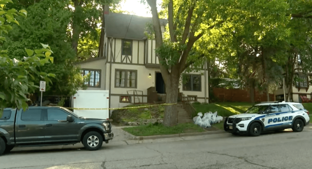 Police tape off VanDuyne's home in Madison, Wisconsin after his arrest.