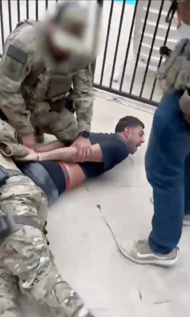 Federal agents tackle a Venezuelan migrant during a string of arrests in San Diego, Calif.