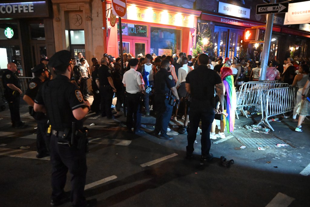 Police officers at the scene of a shooting near the Stonewall Inn.