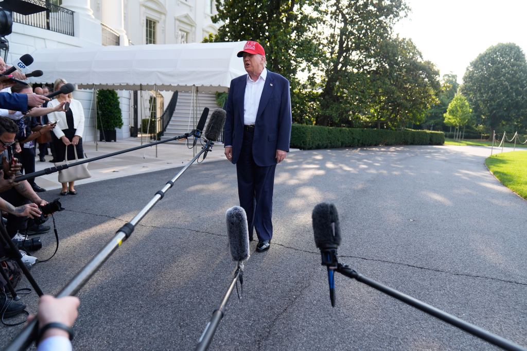 Donald Trump speaking to reporters outside the White House.