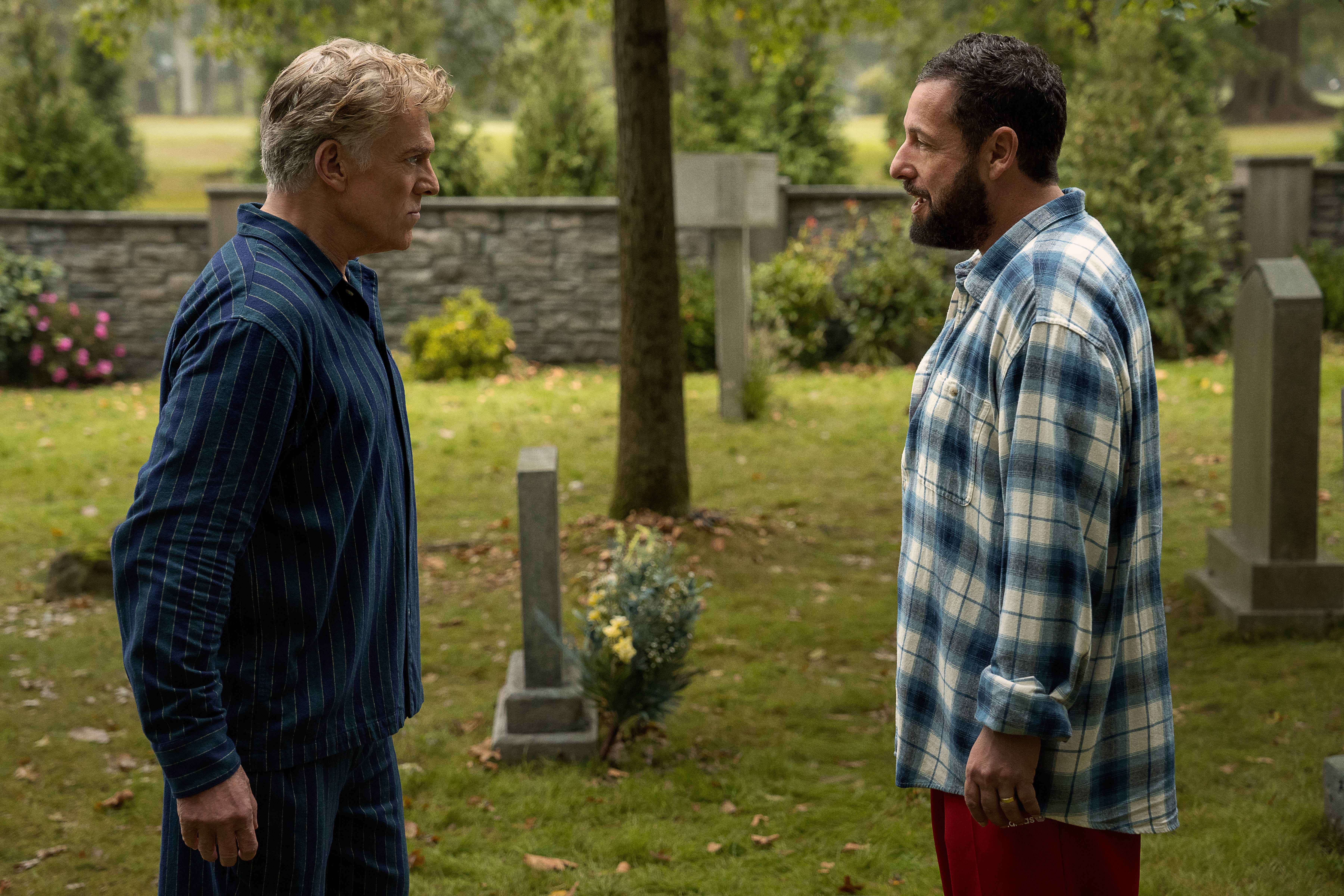 Christopher McDonald and Adam Sandler standing in a graveyard