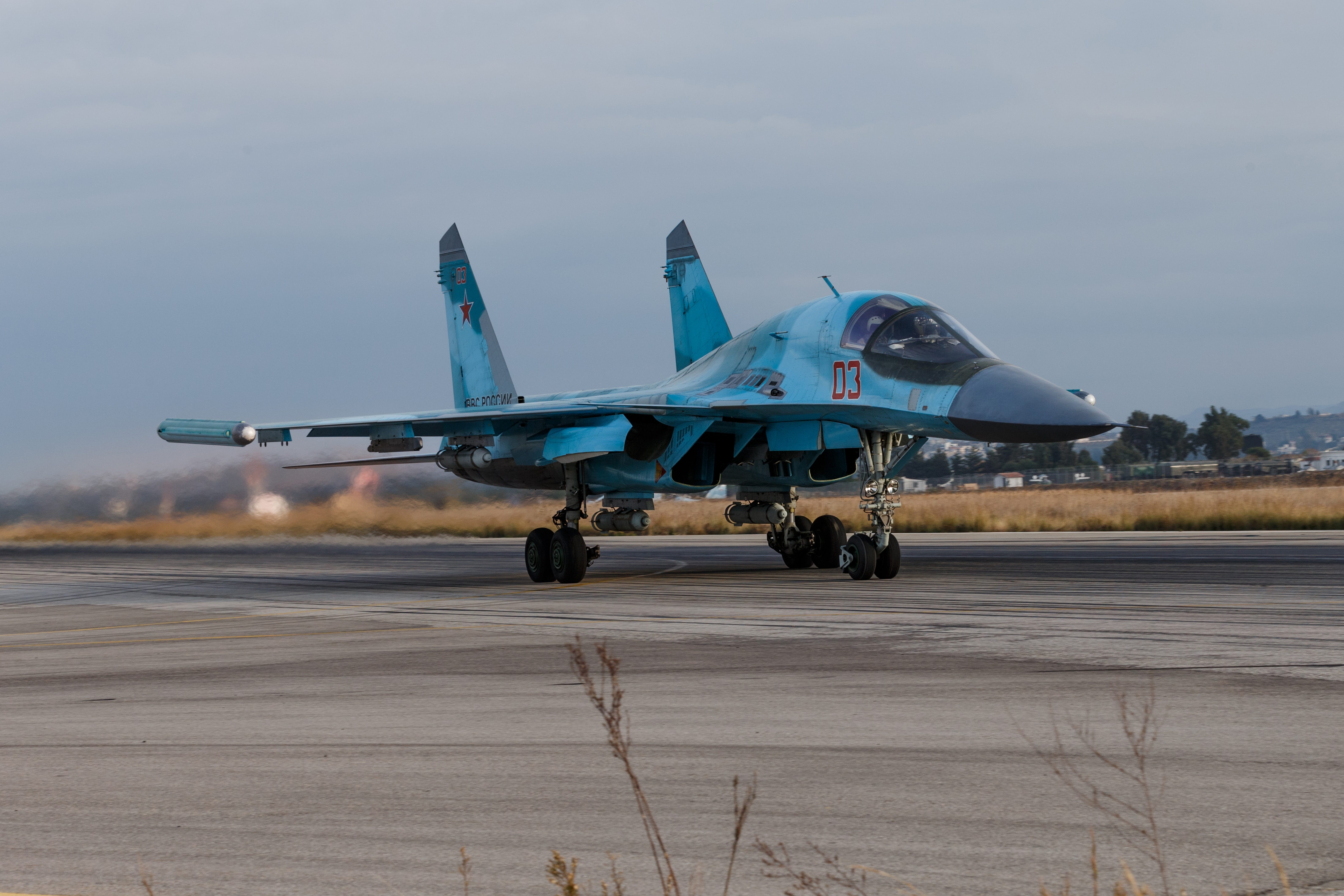 In this photo taken on Wednesday, Dec. 16, 2015 and provided by the Russian Defense Ministry Press Service, a Russian Su-34 bomber taxies out at Hemeimeem air base in Syria.