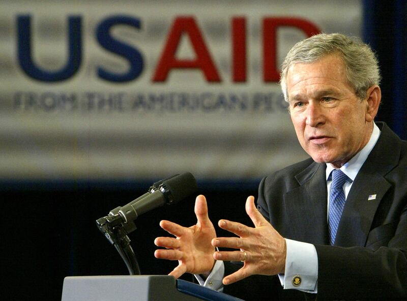 US President George W. Bush addresses USAID employees and non-government organzation (NGO) presidents 10 January 2005 inside the Ronald Reagan Building and International Trade Center in Washington, DC. Bush underlined Washington's full commitment to help rehabilitate and rebuild Asia's tsunami-afflicted economies. AFP Photo/Paul J. Richards (Photo by Paul J. RICHARDS / AFP) (Photo by PAUL J. RICHARDS/AFP via Getty Images)