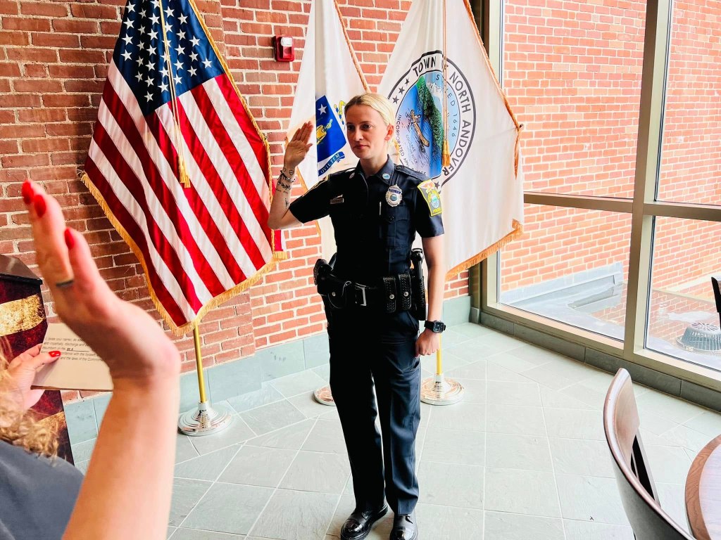 Police officer Kelsey Fitzsimmons taking the oath of office.