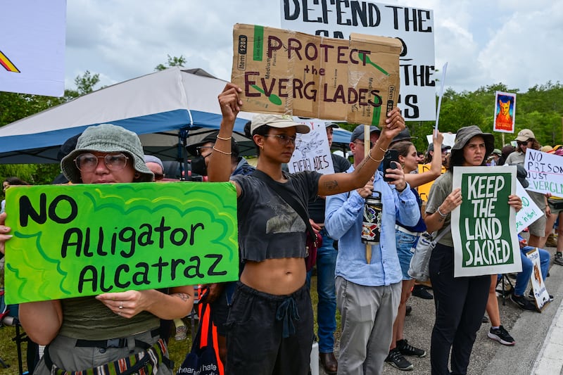 Demonstrators protest the construction of an immigrant detention center, dubbed "Alligator Alcatraz," in the Everglades near Ochopee, Florida, on June 28, 2025.