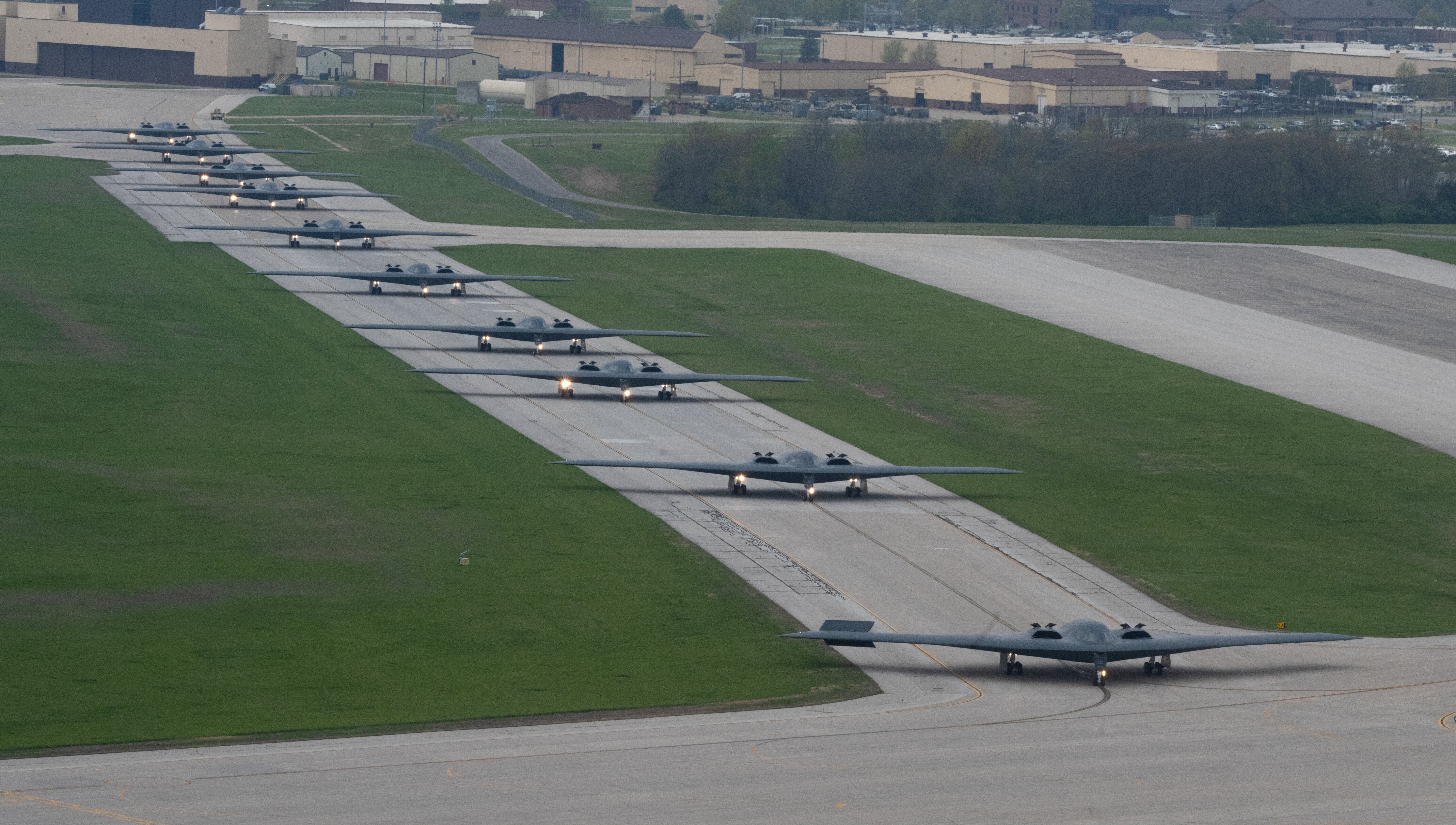 B-2 Spirit stealth bombers assigned to the 509th Bomb Wing taxi on the runway at Whiteman Air Force Base, Mo., April 15, 2024.