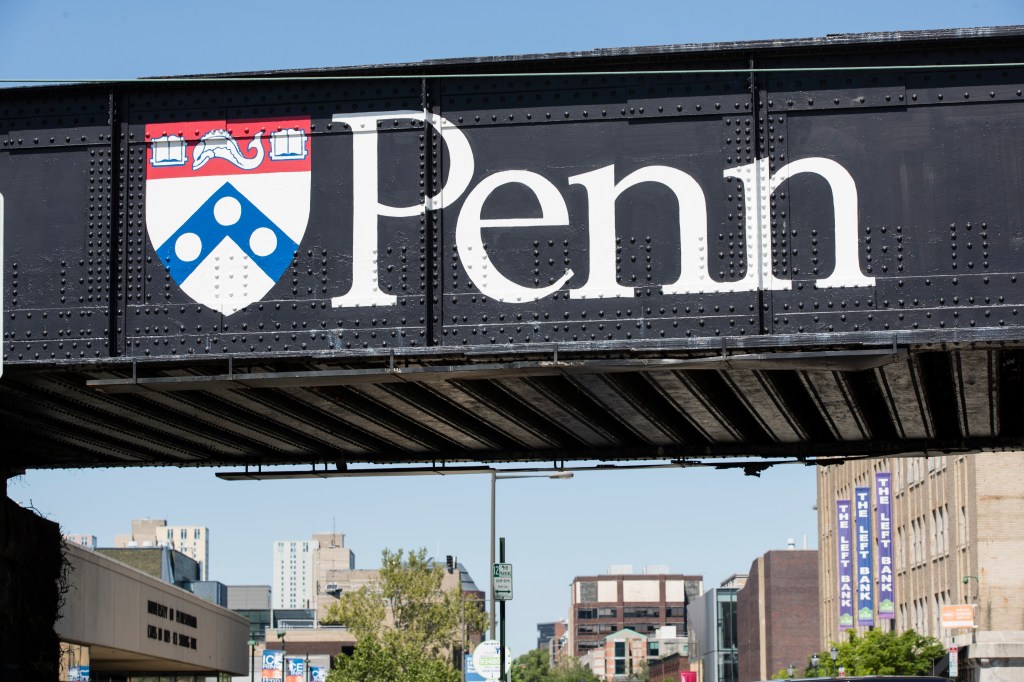 University of Pennsylvania signage on a bridge.