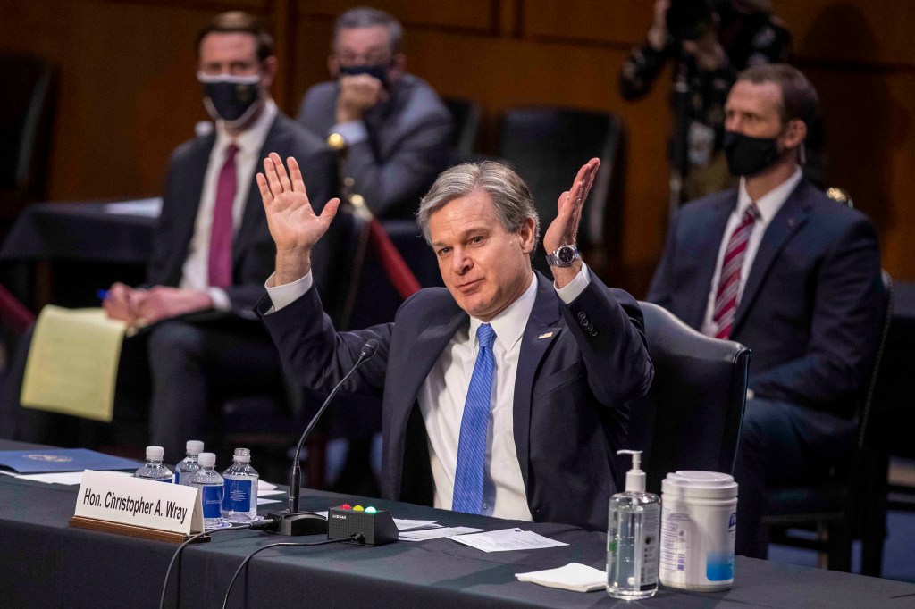 FBI Director Christopher Wray testifying before the Senate Judiciary Committee.