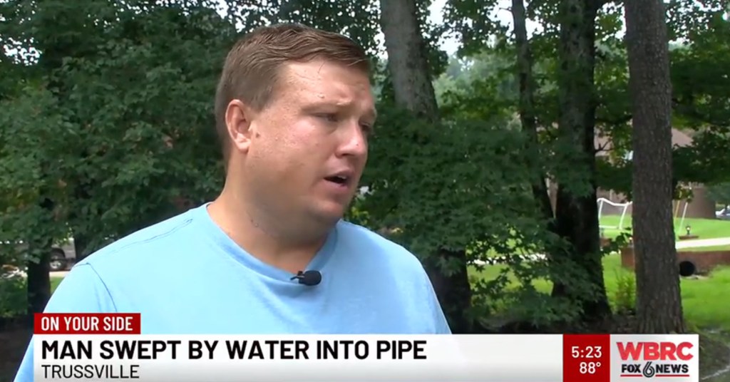 Man describes being swept into a drainage pipe.
