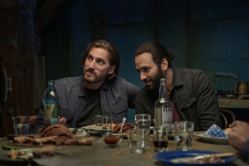 Luca Marinelli as Nicky and Marwan Kenzari as Joe