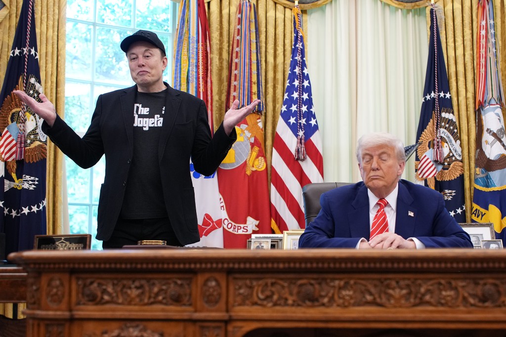Elon Musk and Donald Trump at a press conference in the Oval Office.