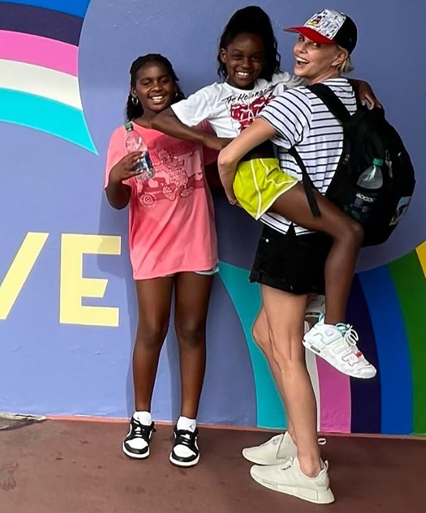 Charlize Theron with her two daughters.