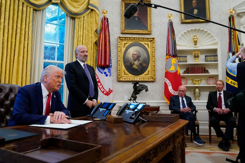 The Wall Street Journal, owned by Murdoch (second from right), has taken Trump to task over a host of issues.