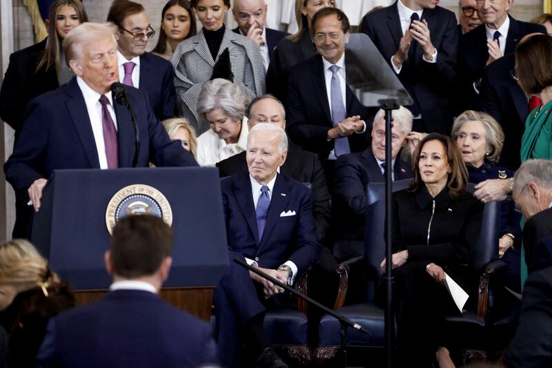 Former US President Joe Biden and former US Vice President Kamala Harris listen as US President Donald Trump (L) delivers remarks after being sworn in as the 47th president of the United States in an inauguration ceremony in the rotunda of the United States Capitol in Washington, DC, USA, 20 January 2025. Trump’s planned outdoor inauguration ceremonies and events are being held inside today due to a forecast of extreme cold temperatures.    SHAWN THEW/Pool via REUTERS     TPX IMAGES OF THE DAY