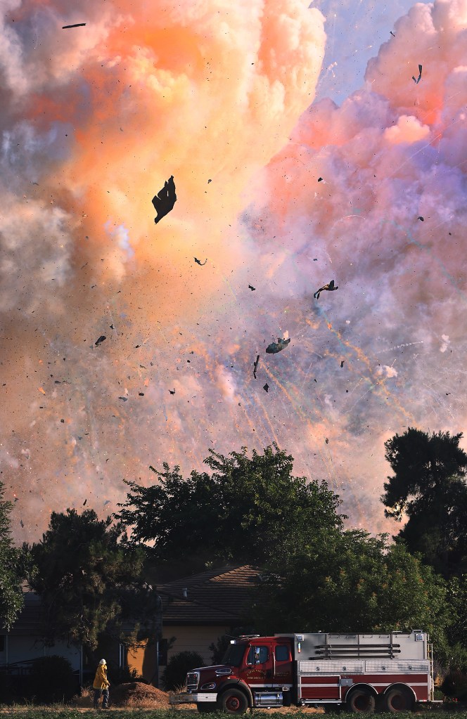 Fireworks explode at a fireworks warehouse near Esparto, Calif., Tuesday, July 1, 2025.