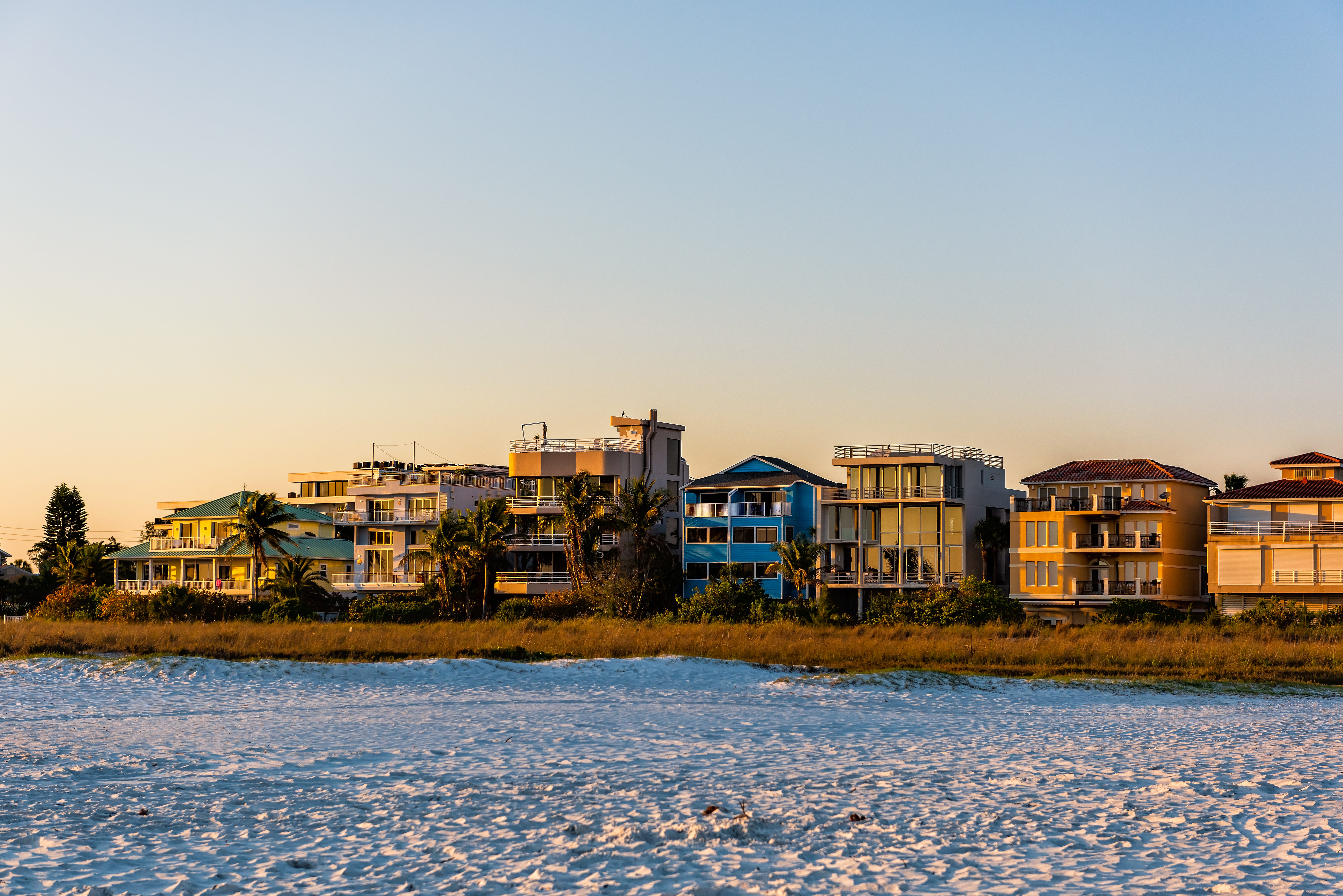 A row of homes on the beach in Sarasota, FL.