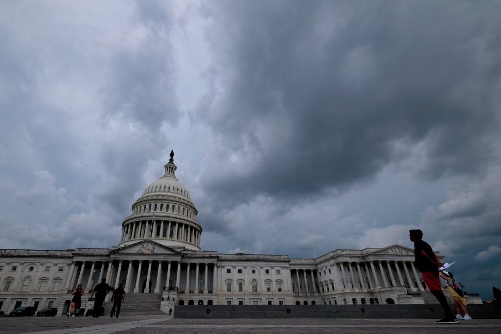 Storm clouds hover over the U.S. Capitol shortly after the Senate passed its version of the One, Big, Beautiful Bill Act on July 01, 2025 in Washington, DC. Republicans