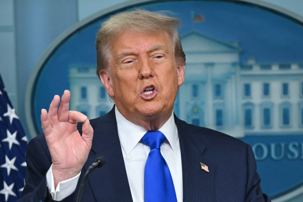 Photo of Donald Trump speaking at a press conference.